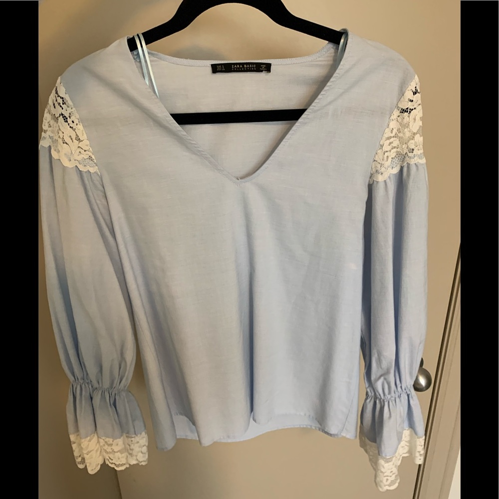 Light blue blouse with lace detail